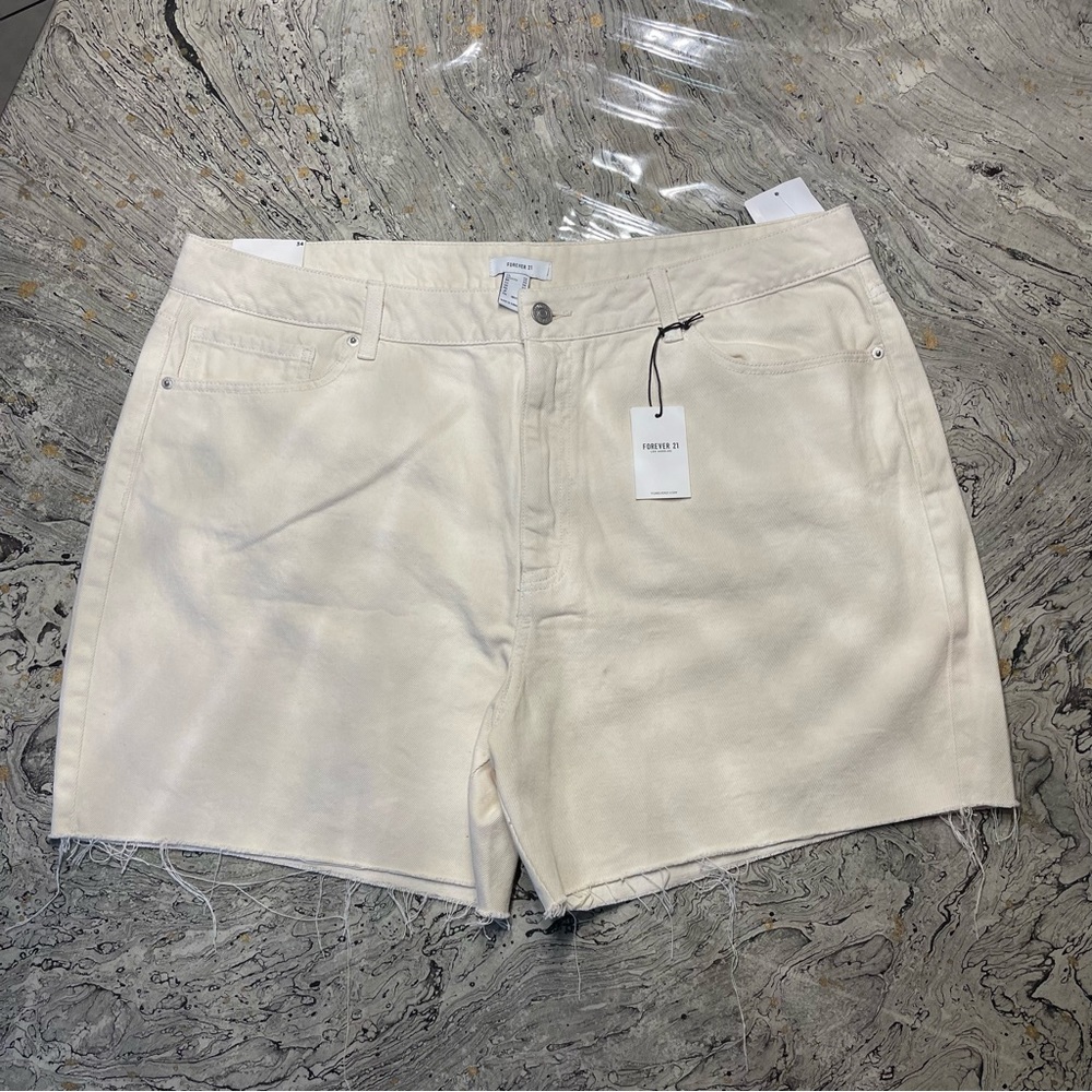 Mid-Rise Raw-Cut Denim Shorts
Size 34
Color is light beige
Brand is Forever 21 - Picture 3 of 6